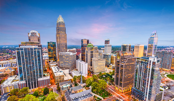 Charlotte, NC skyline with buildings and city lights