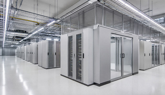 Clean data center facility with server containment pods and overhead cable trays