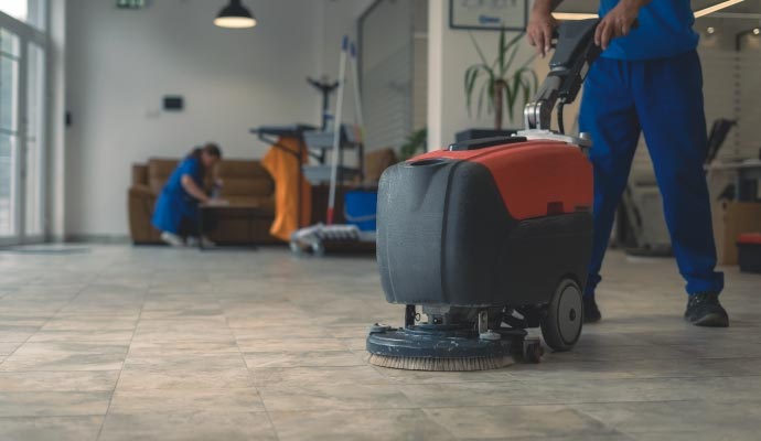 Expert cleaners cleaning a commercial space