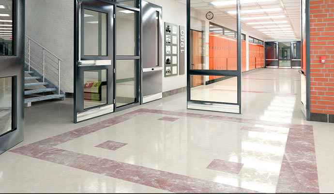 Cleaned tile floor in a school lobby