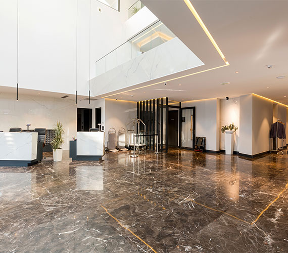 A luxurious hotel lobby with marble flooring