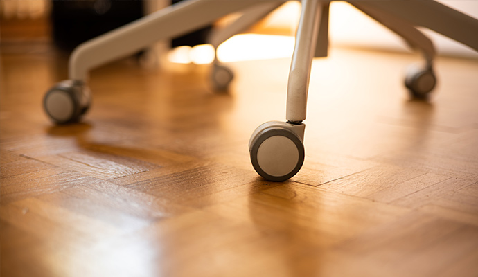 Office chair wheels on hardwood floor