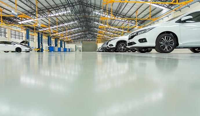 Polished garage floor showing multiple parked cars