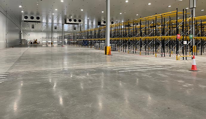 Commercial warehouse floor after stripping and polishing