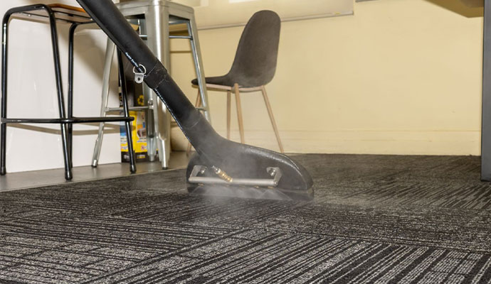 Carpet cleaning by hot water extraction