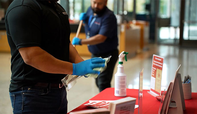 A REDLEE/SCS, INC. employee cleaning items