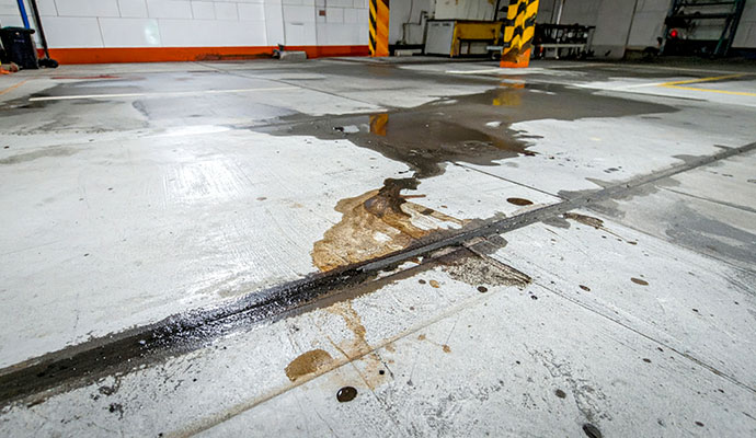 Spilled oil on garage floor