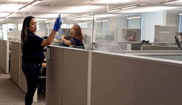 A Professional cleaning an office room