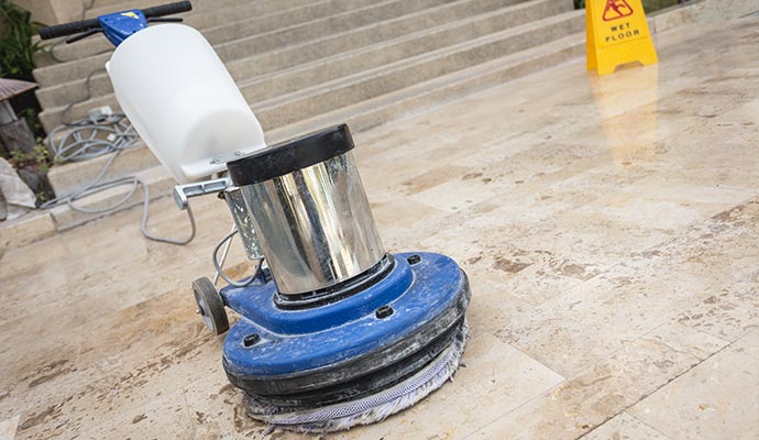 Stone floor cleaning with equipment