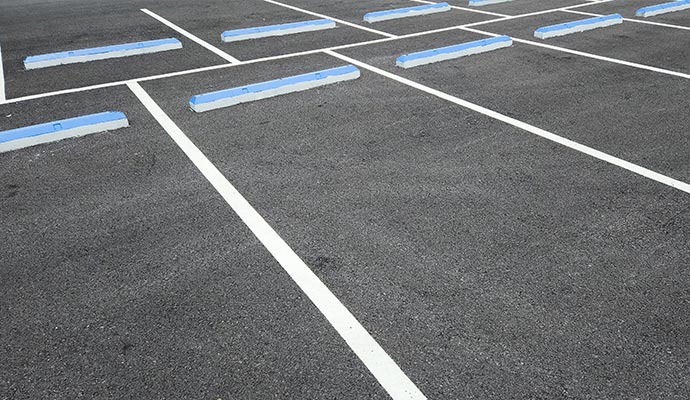 Striped parking lot with white lines